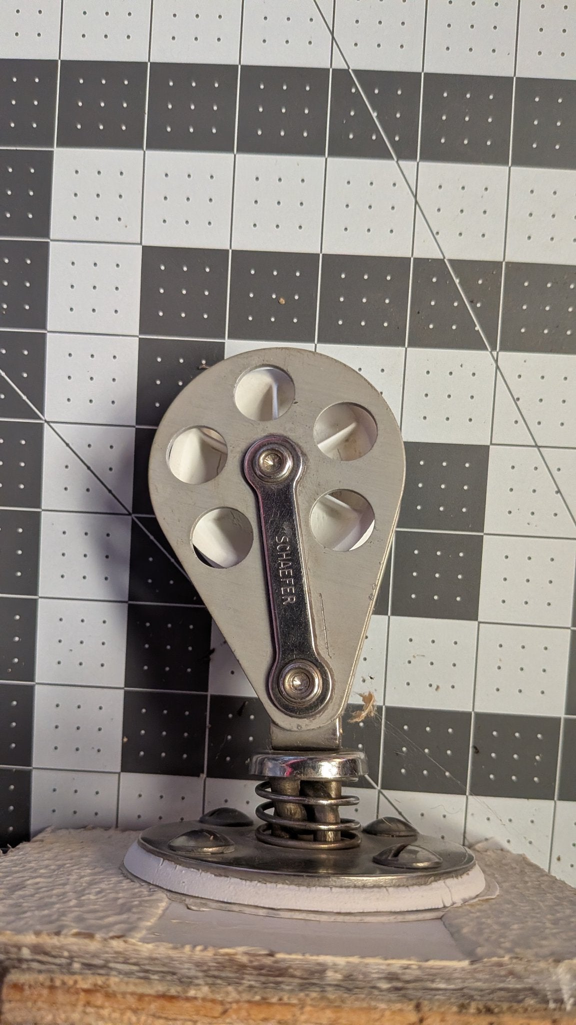 Schaefer stand-up block with spring base on 1-inch grid