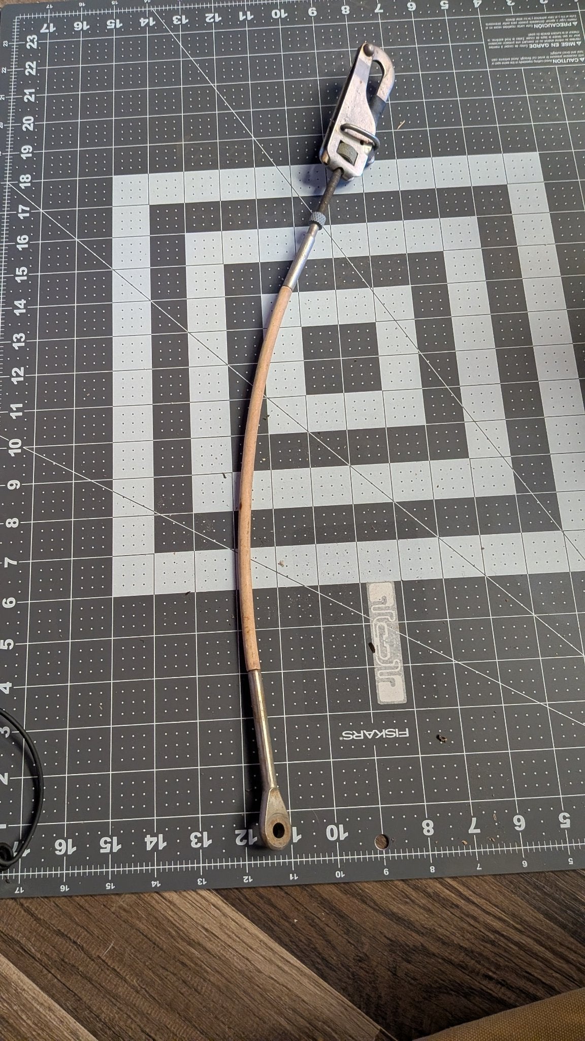 Full lifeline gate assembly with wire cable on cutting mat