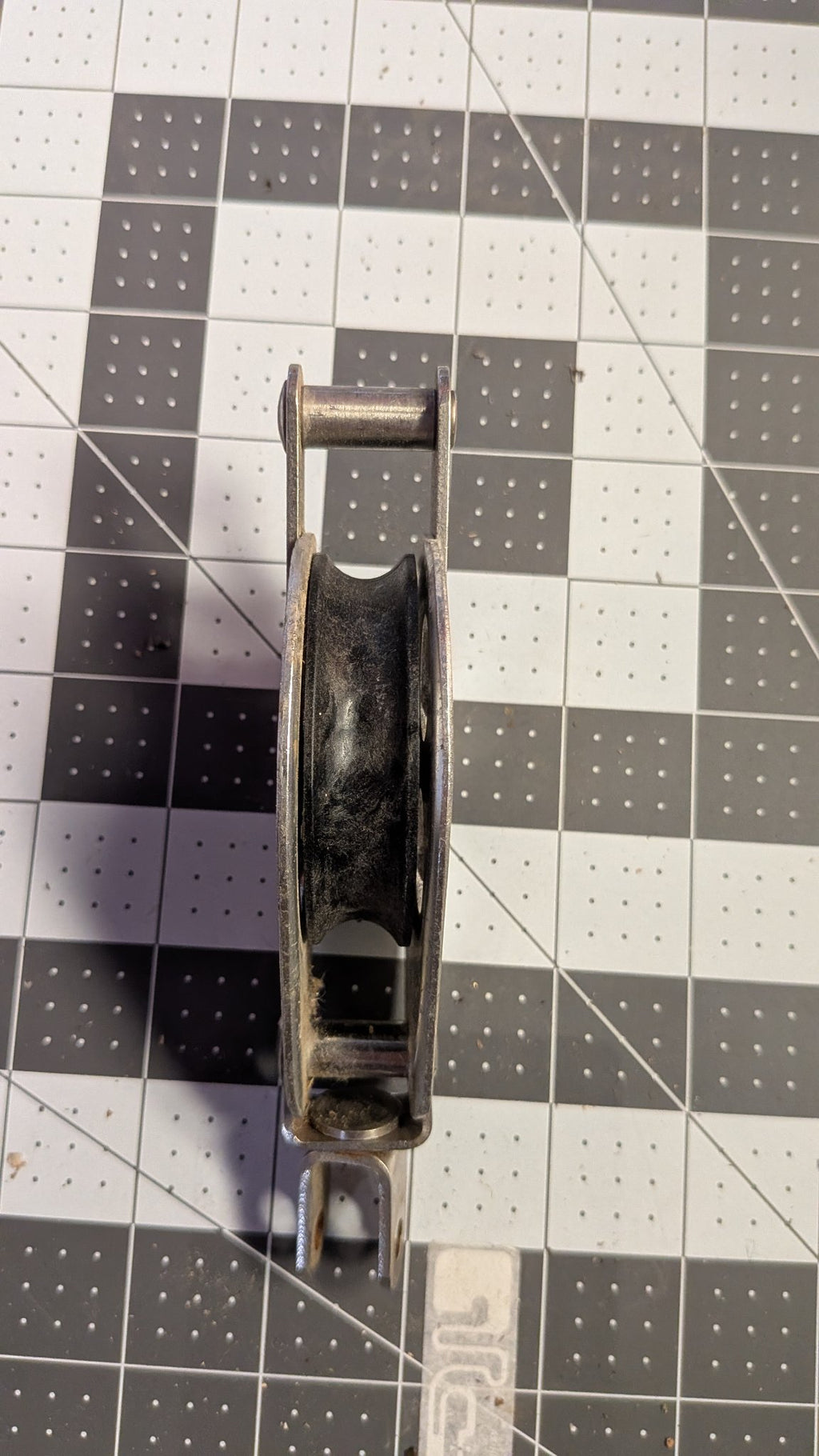 Side view of South Coast block showing black sheave on 1-inch grid