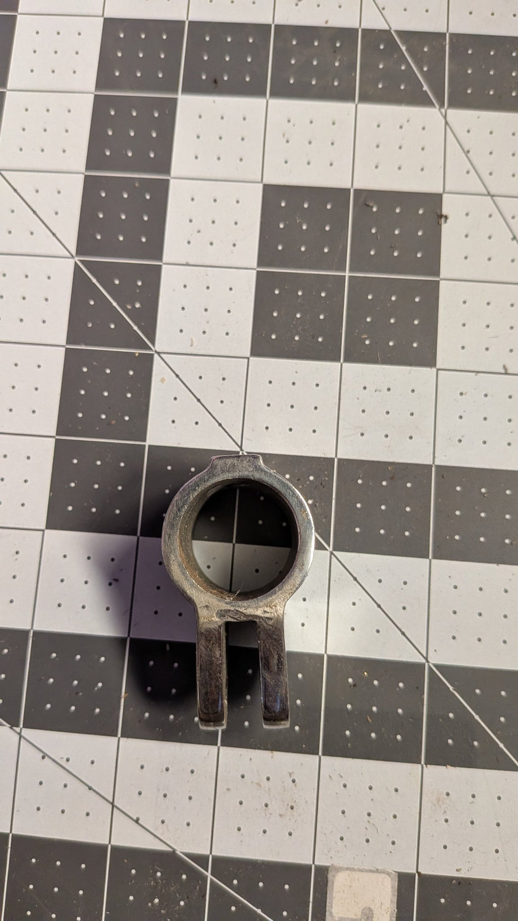 Top view of jaw slide showing clamp opening on 1-inch grid