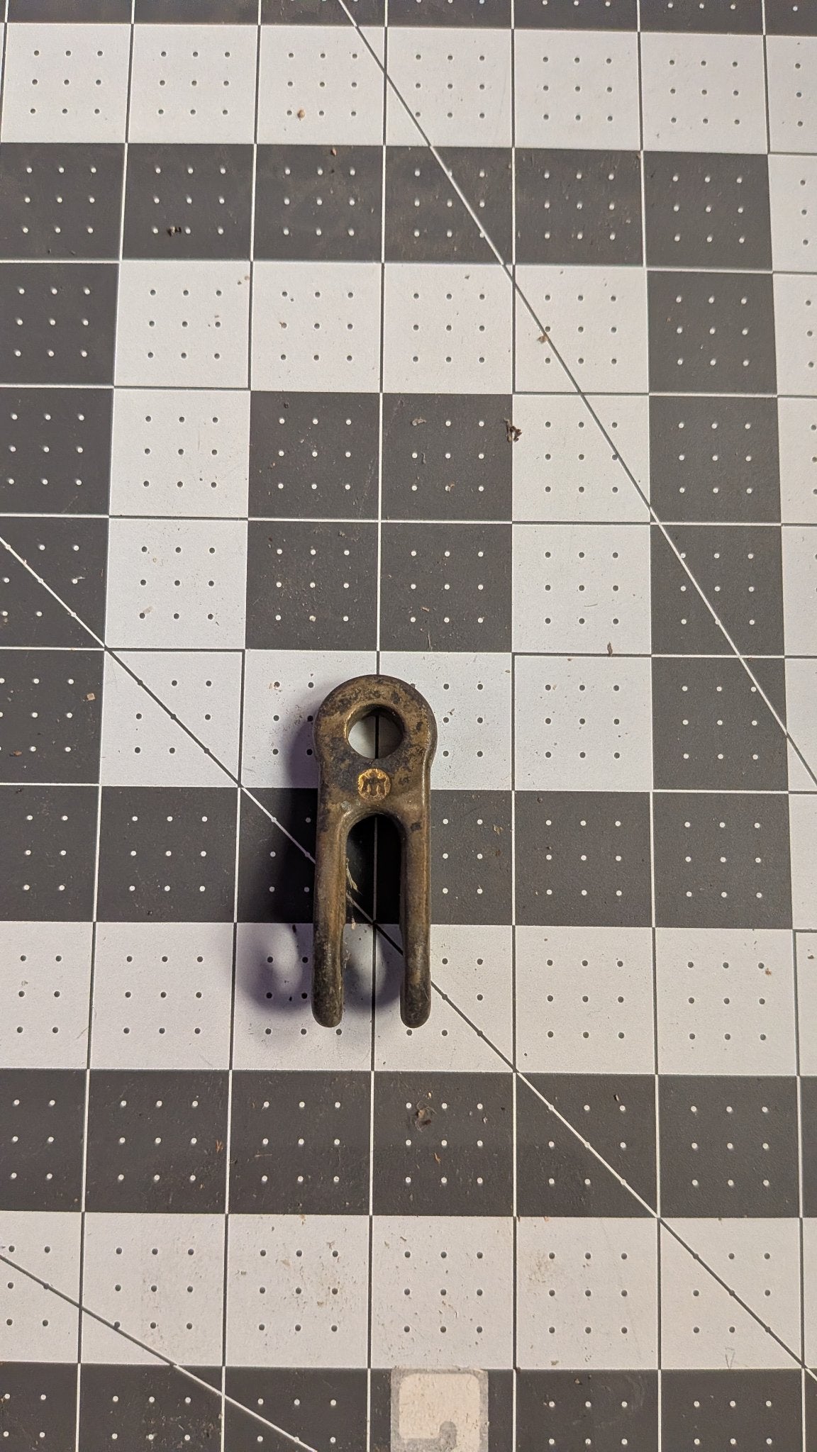Vintage Merriman bronze rigging toggle front view on 1-inch grid