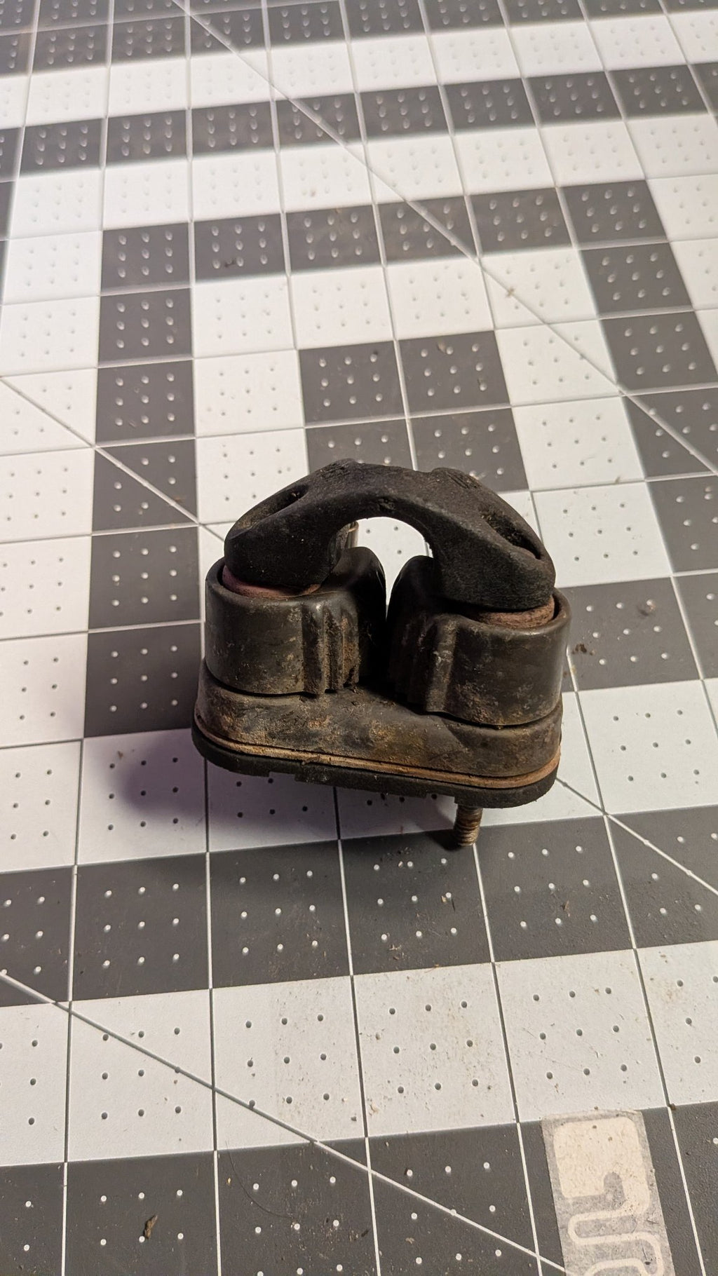 Harken cam cleat with fairlead front view on 1-inch grid