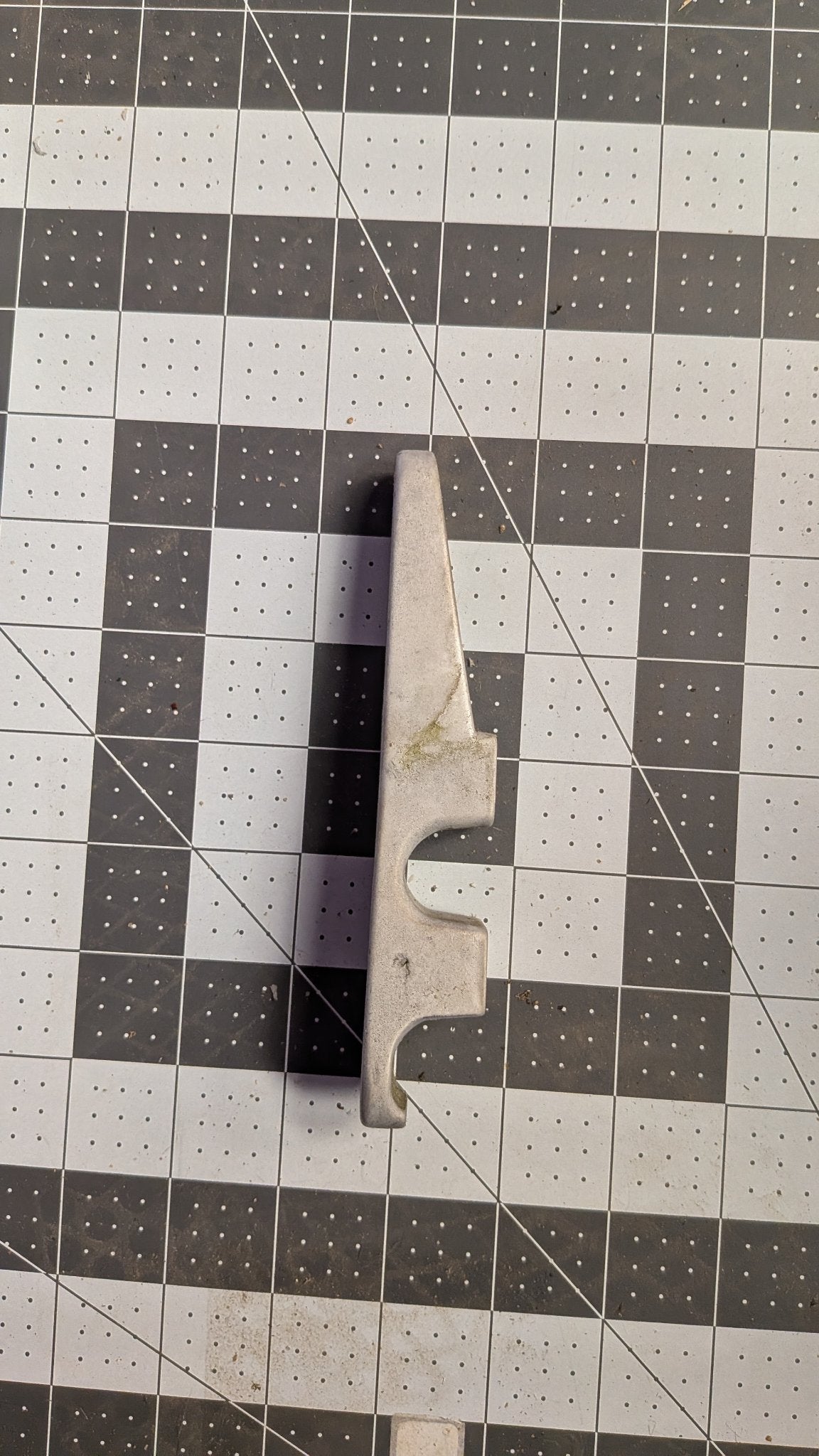 Side view of aluminum fairlead on 1-inch grid