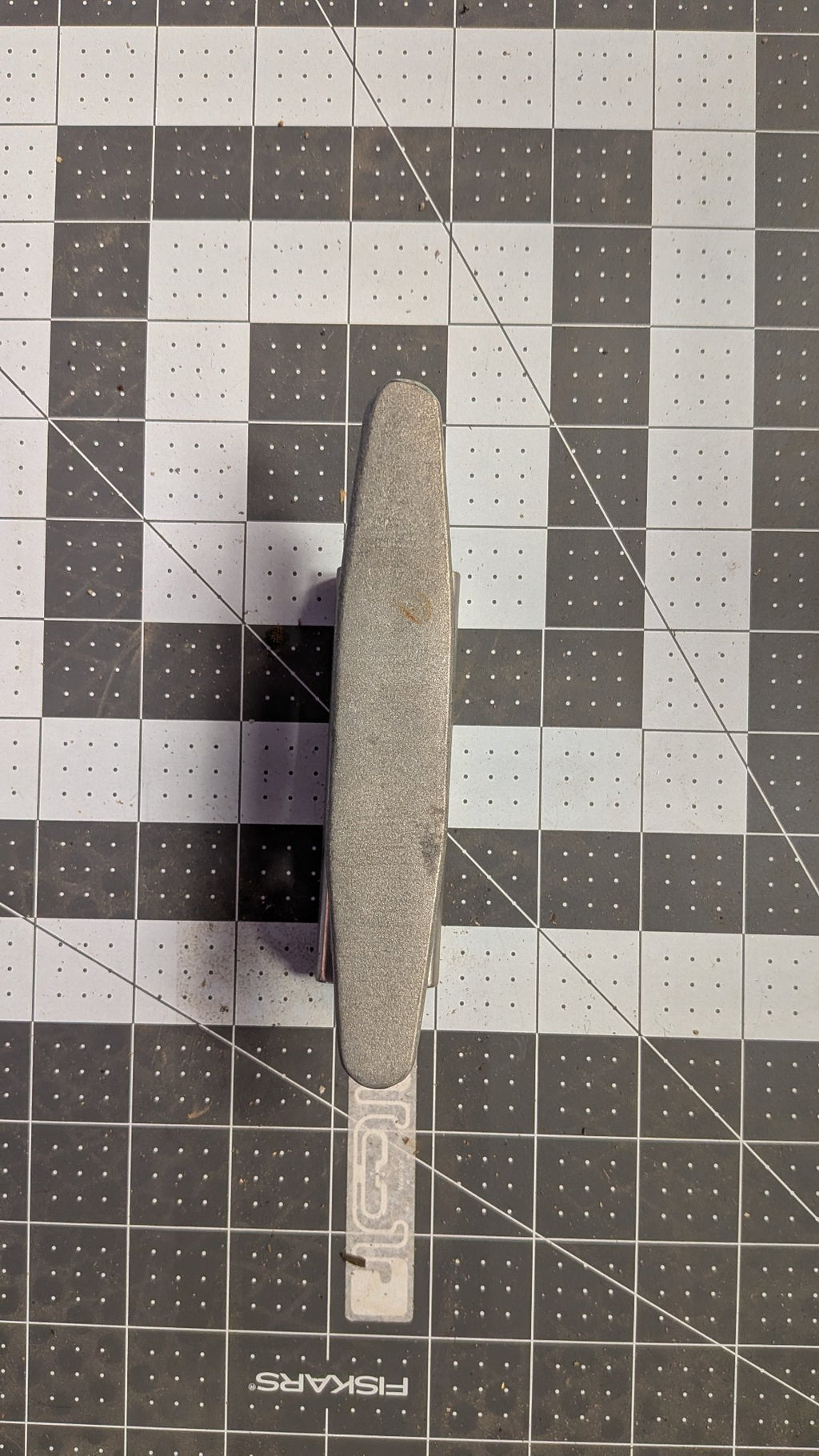 Aluminum cleat top view on 1-inch grid