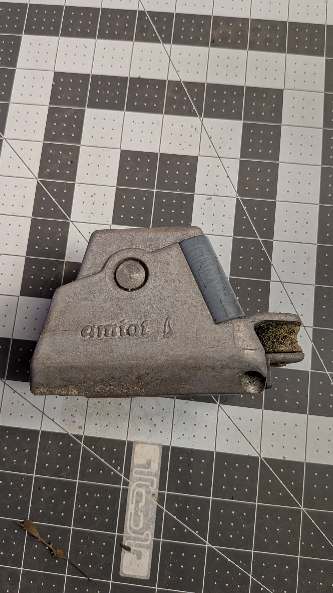 Amiot track car showing amiot stamp on 1-inch grid