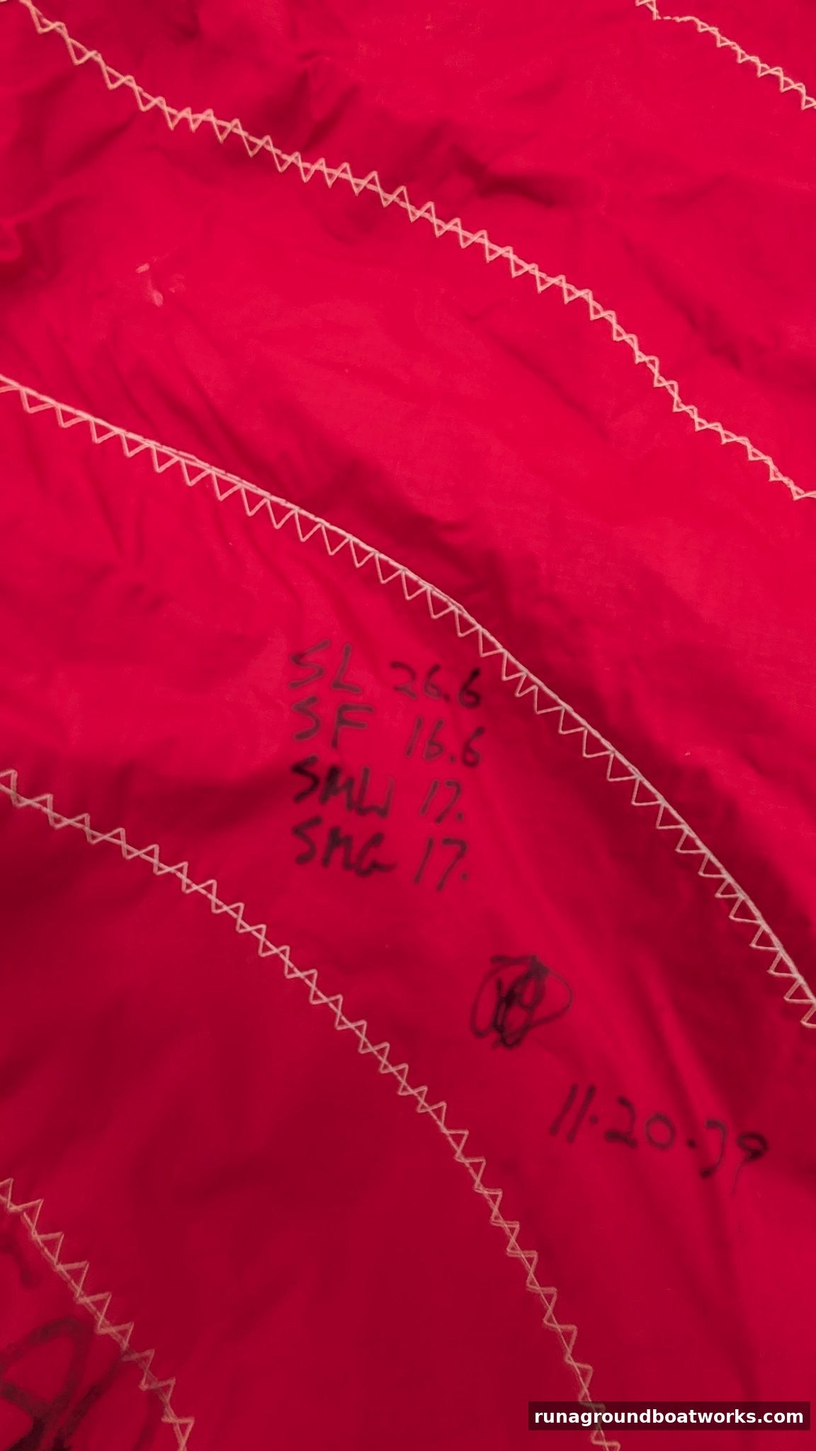 Measurements handwritten on the Hood Sails spinnaker — luff 26.6 ft, foot 16.6 ft, mid-width 17 ft
