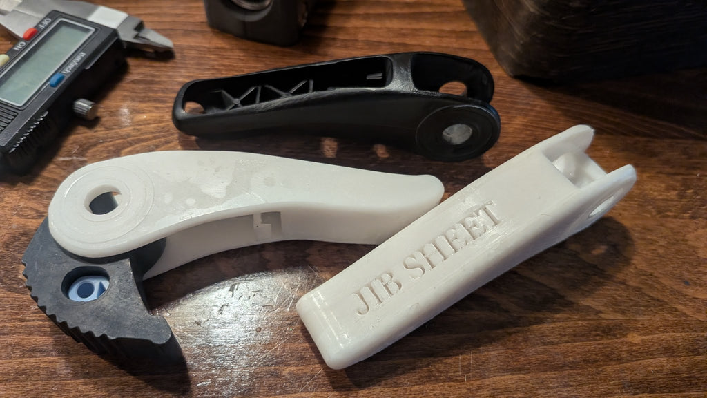 XAS replacement handle prototype with JIB SHEET embossed insert and original handle