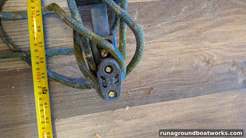 Traveler track end with tape measure