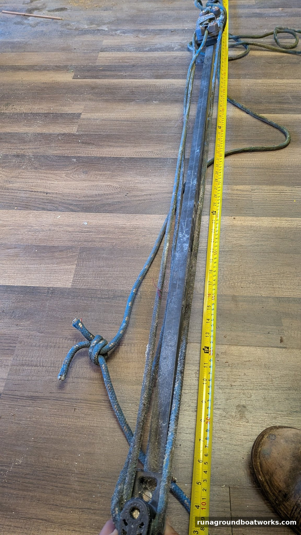 Harken mainsheet traveler off an Ericson 25 Plus, full track with tape measure