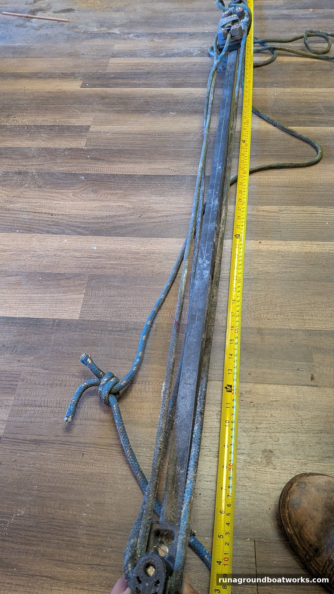 Harken mainsheet traveler off an Ericson 25 Plus, full track with tape measure