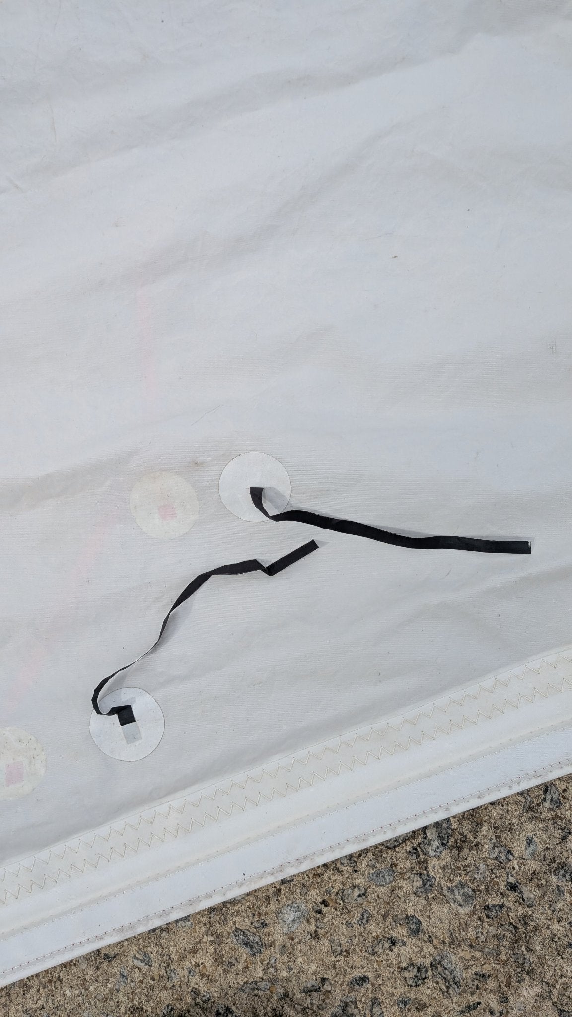 Telltale ribbon on the jib, in good shape