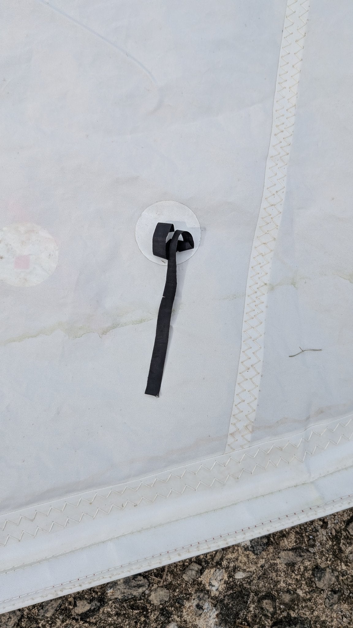 Telltale ribbon on the jib, in good shape