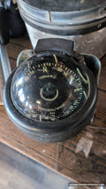 Danforth White Corsair marine compass, front, black card with degree and cardinal markings