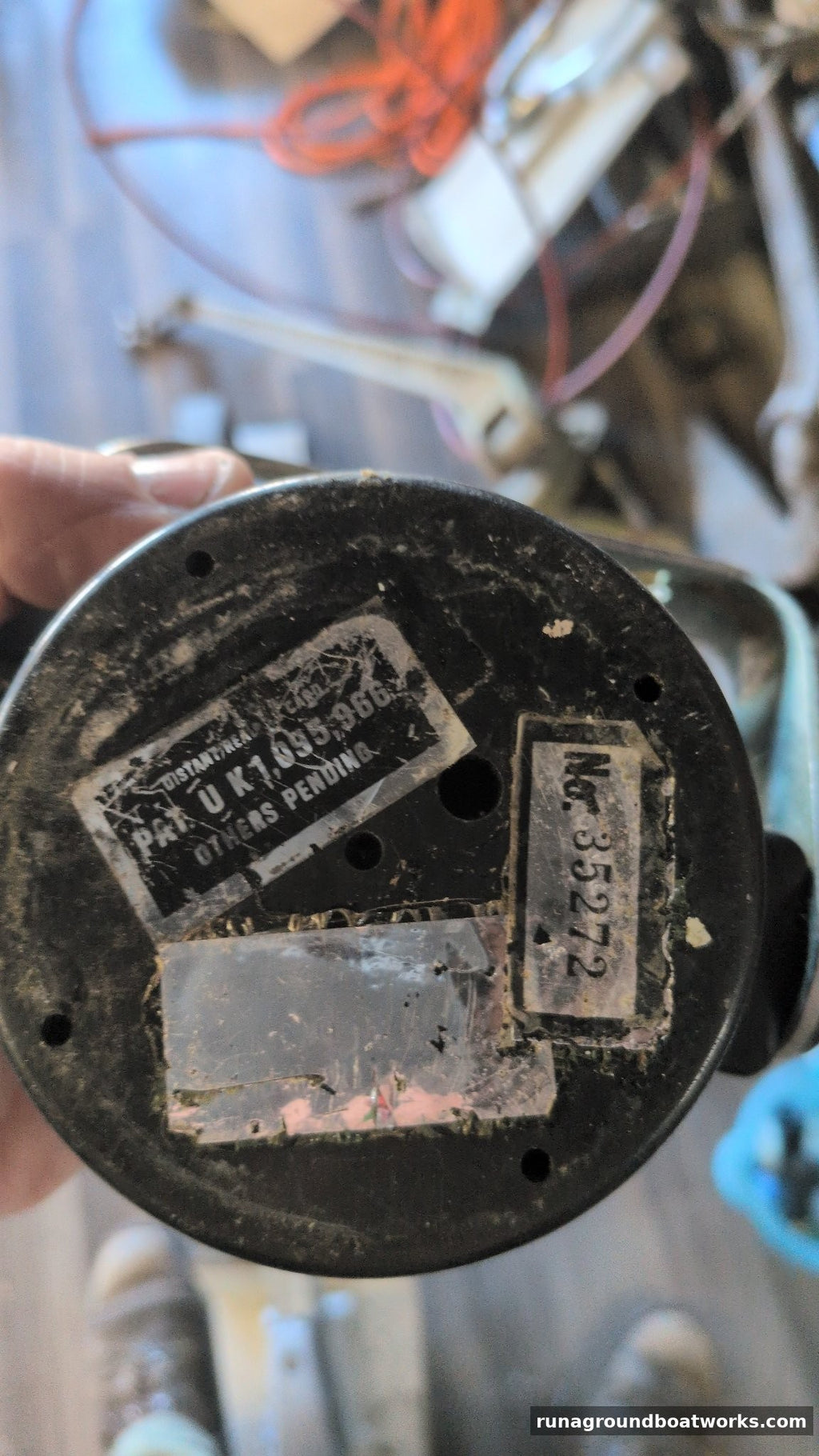 Base of the Danforth Corsair compass showing the labels and serial No. 35272