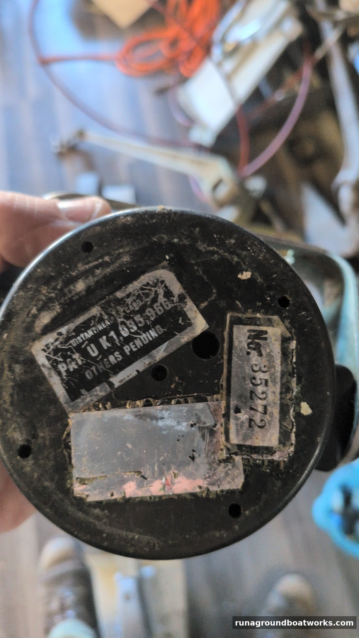 Base of the Danforth Corsair compass showing the labels and serial No. 35272