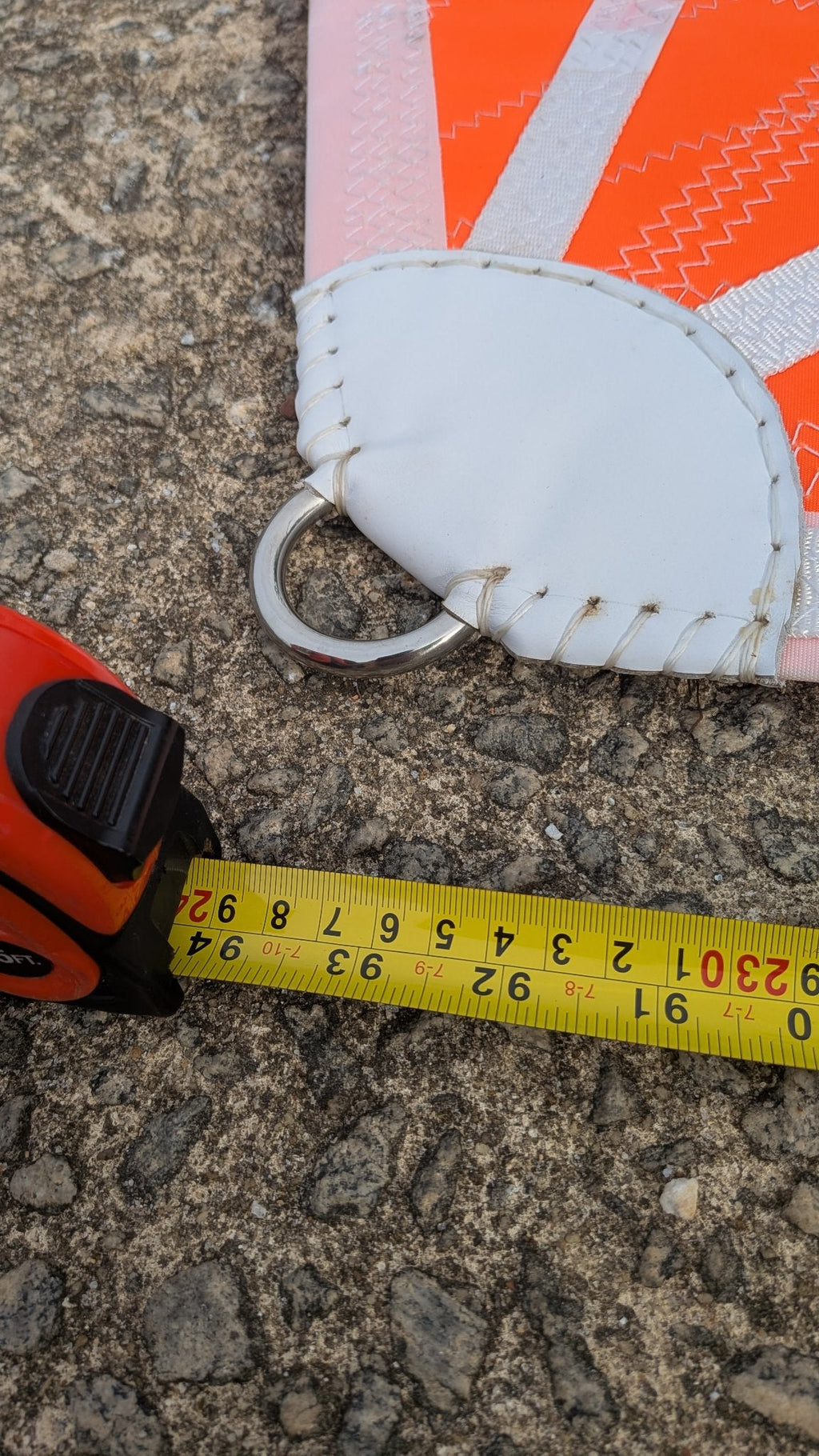 Tack ring with tape measure for scale