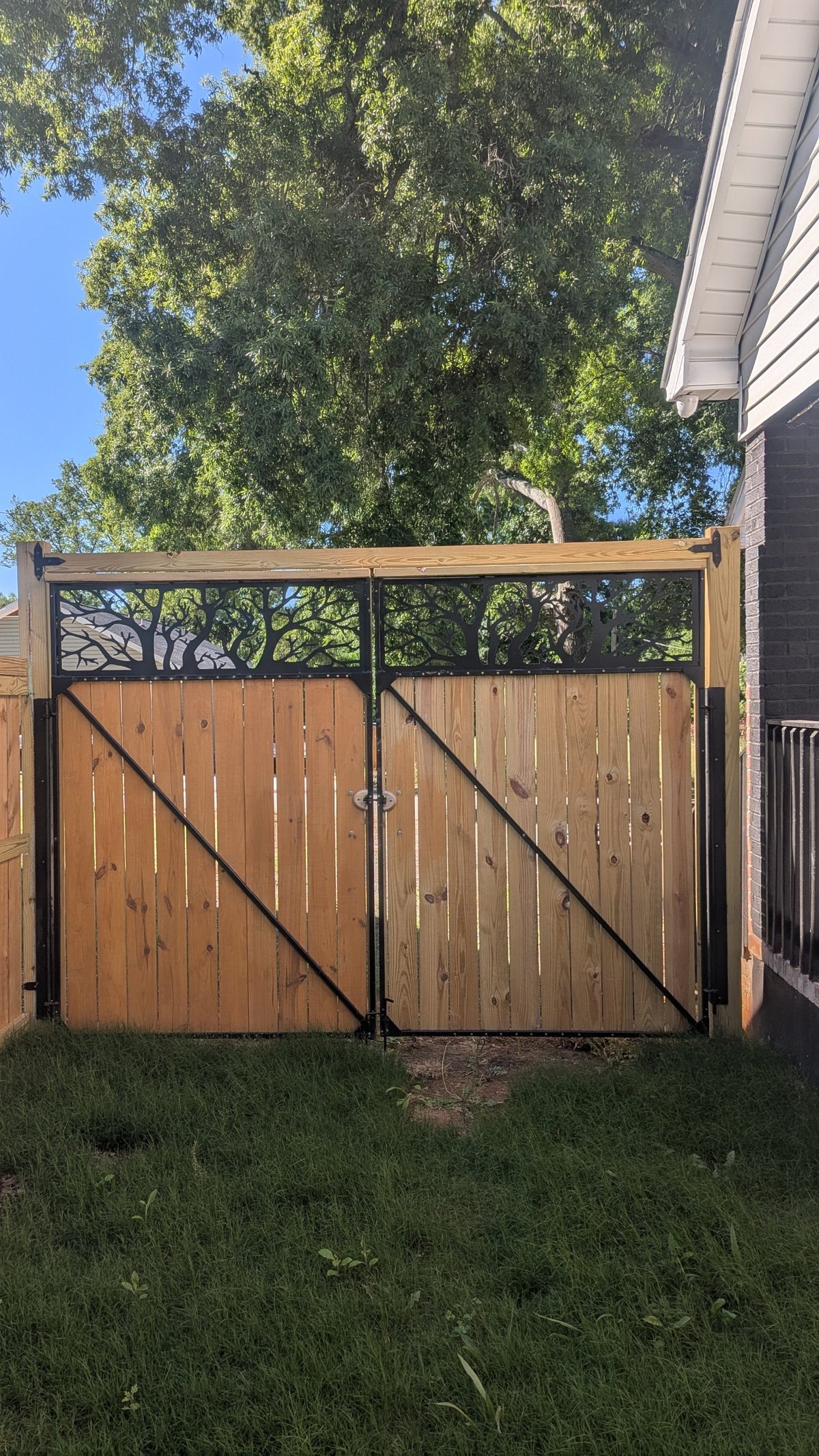 Custom steel and wood double gate by Expressive Door