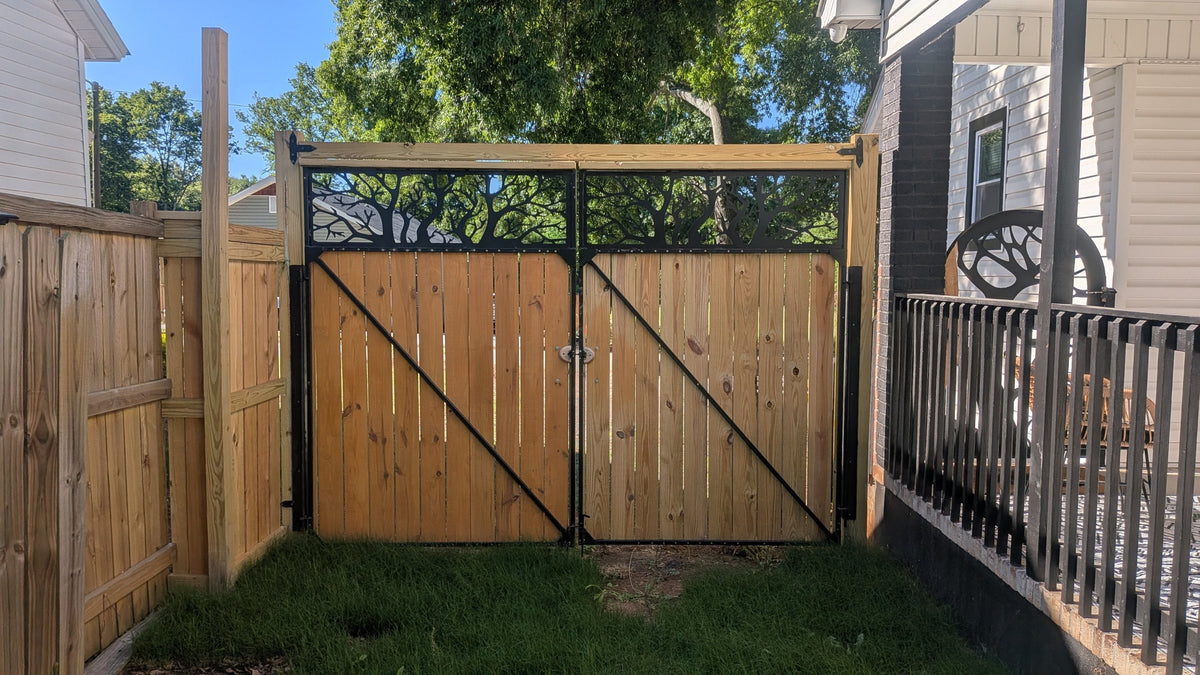 Custom steel garden gate with decorative toppers by Expressive Door