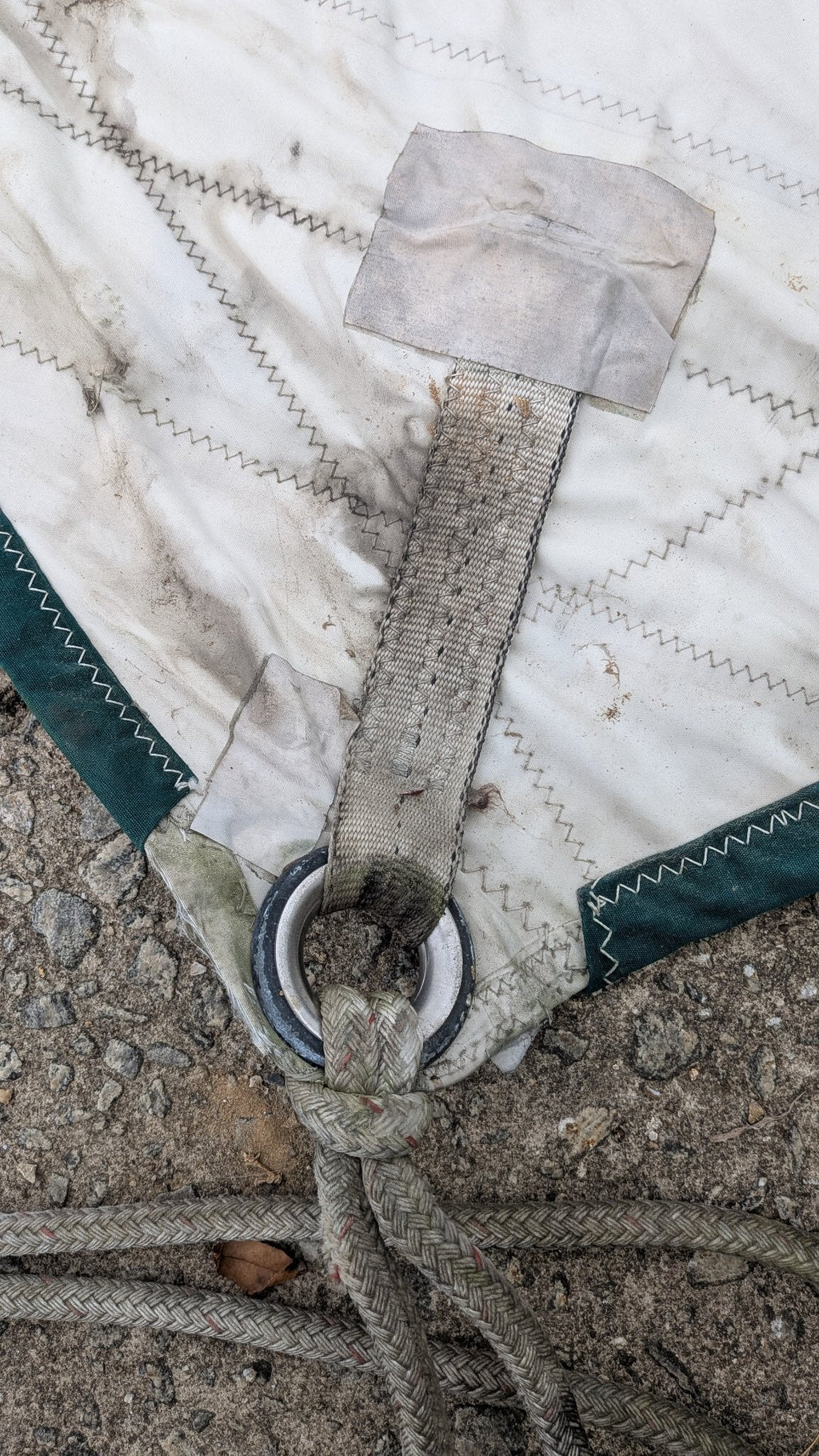 Tack with webbing strap, ring and furling line